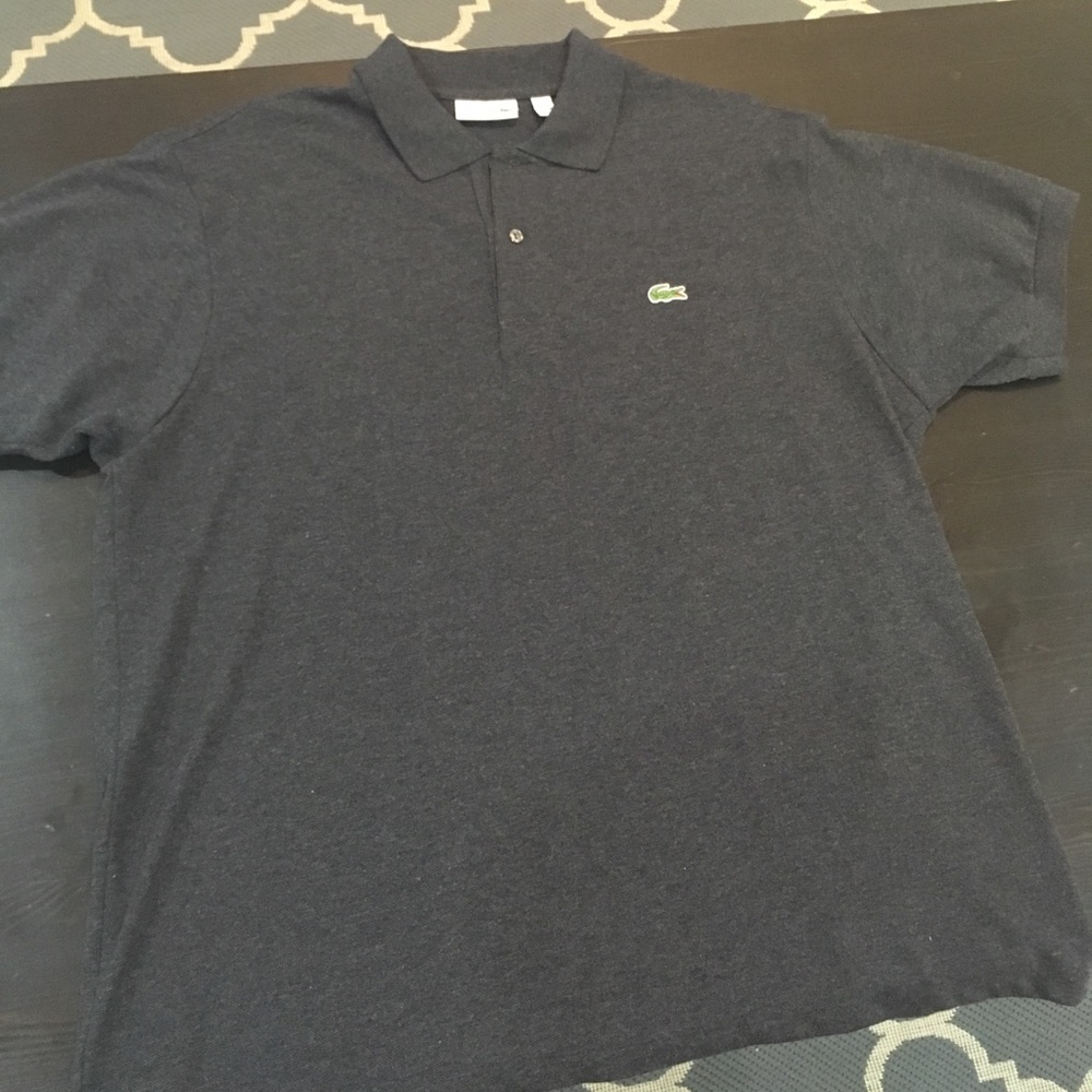 EUC short sleeve polo by Lacoste